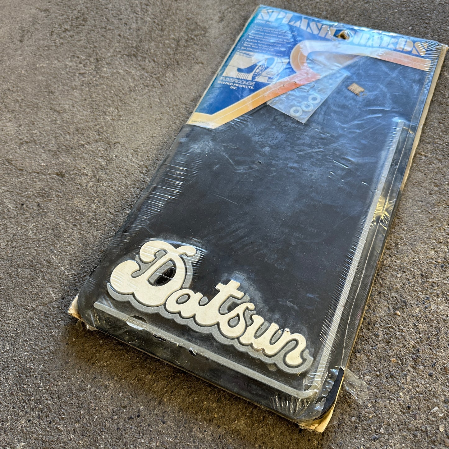 NOS Datsun Mudflaps Small - Plasticolor 14x8