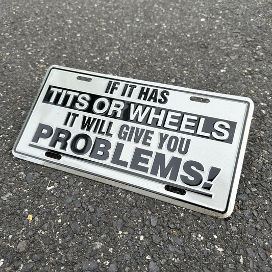 "Tits or Wheels" - Vintage Novelty License Plate