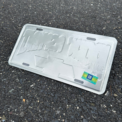 "Kickin' Asphalt" - Genuine GM Vintage Novelty License Plate