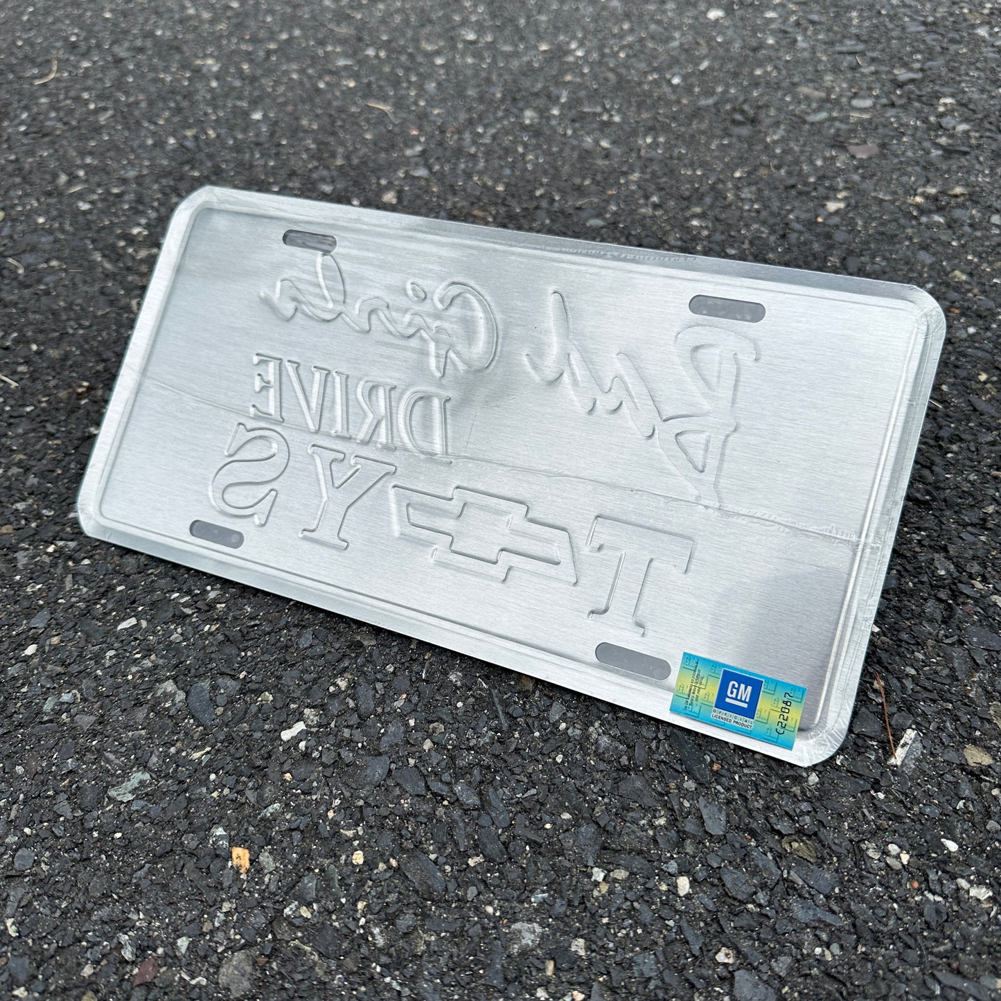 "Bad Girls Drive Bad Toys" - Genuine GM Vintage Novelty License Plate