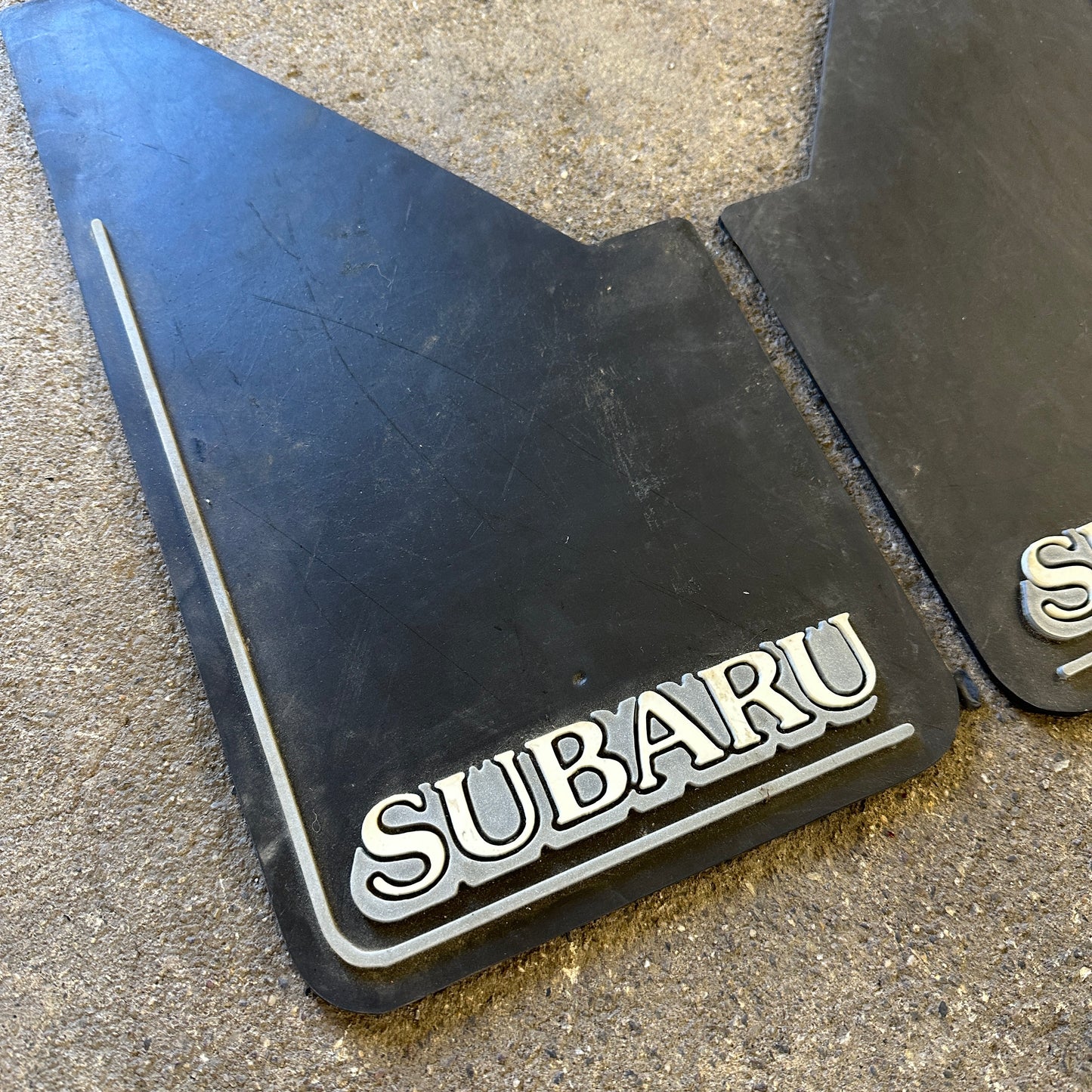 NOS Subaru Mudflaps Small - Plasticolor 14x8